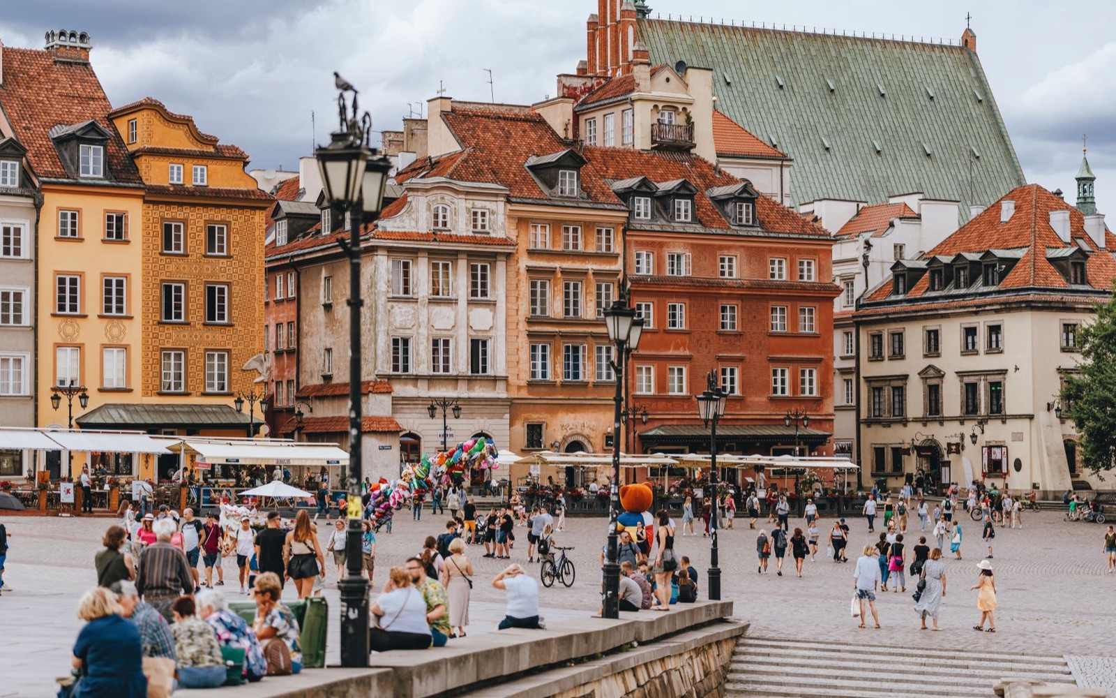 People gathering in Warsaw's historic old town